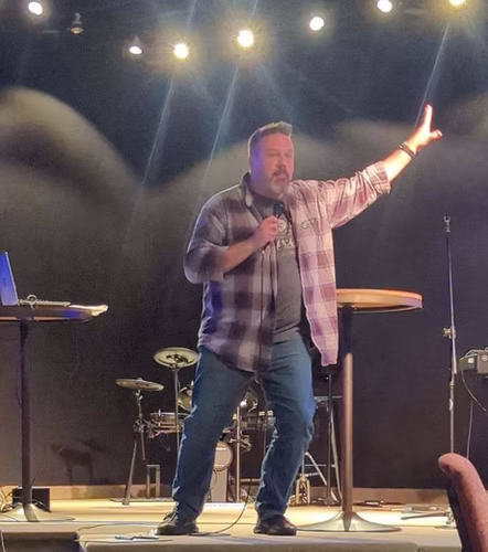 Matt perfomring stand up at The Community House in Muskegon, MI