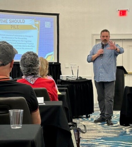 Matt making a presentation a AATH